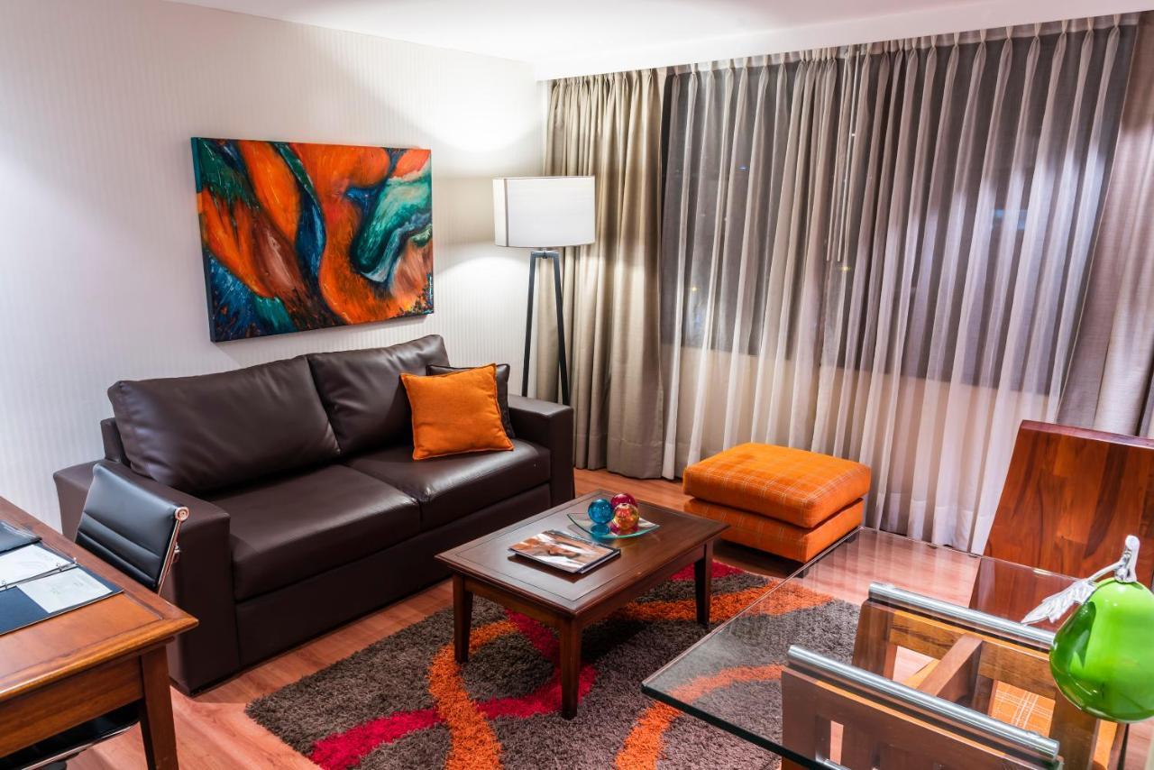 Bogota Plaza Hotel Kültér fotó A living room in a typical apartment at the hotel